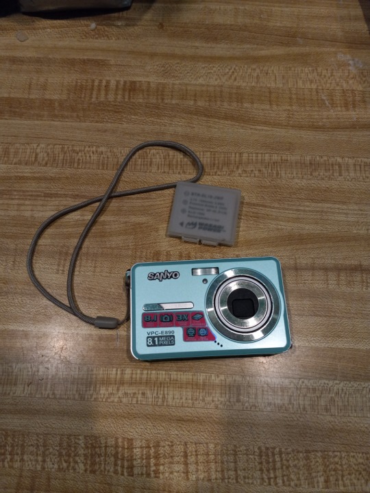 A blue Sanyo digital camera