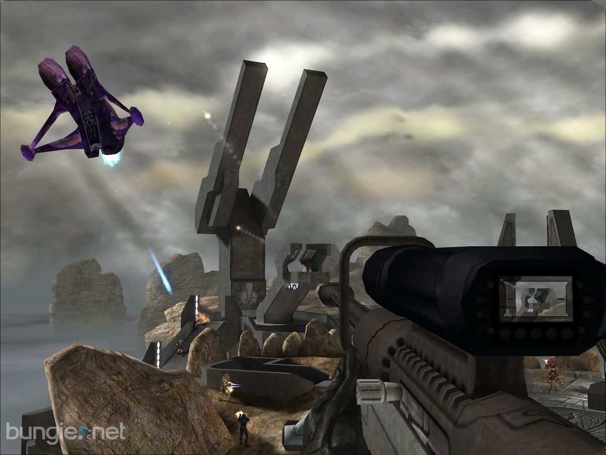 Promotional image for Halo 2 featuring first-person view of a battle on the multiplayer map Ascension. Screenshot from the Halo 2 press kit.
