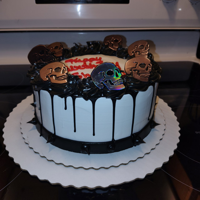 Birthday cake with skulls that says, 'Happy Birthday Shadow'