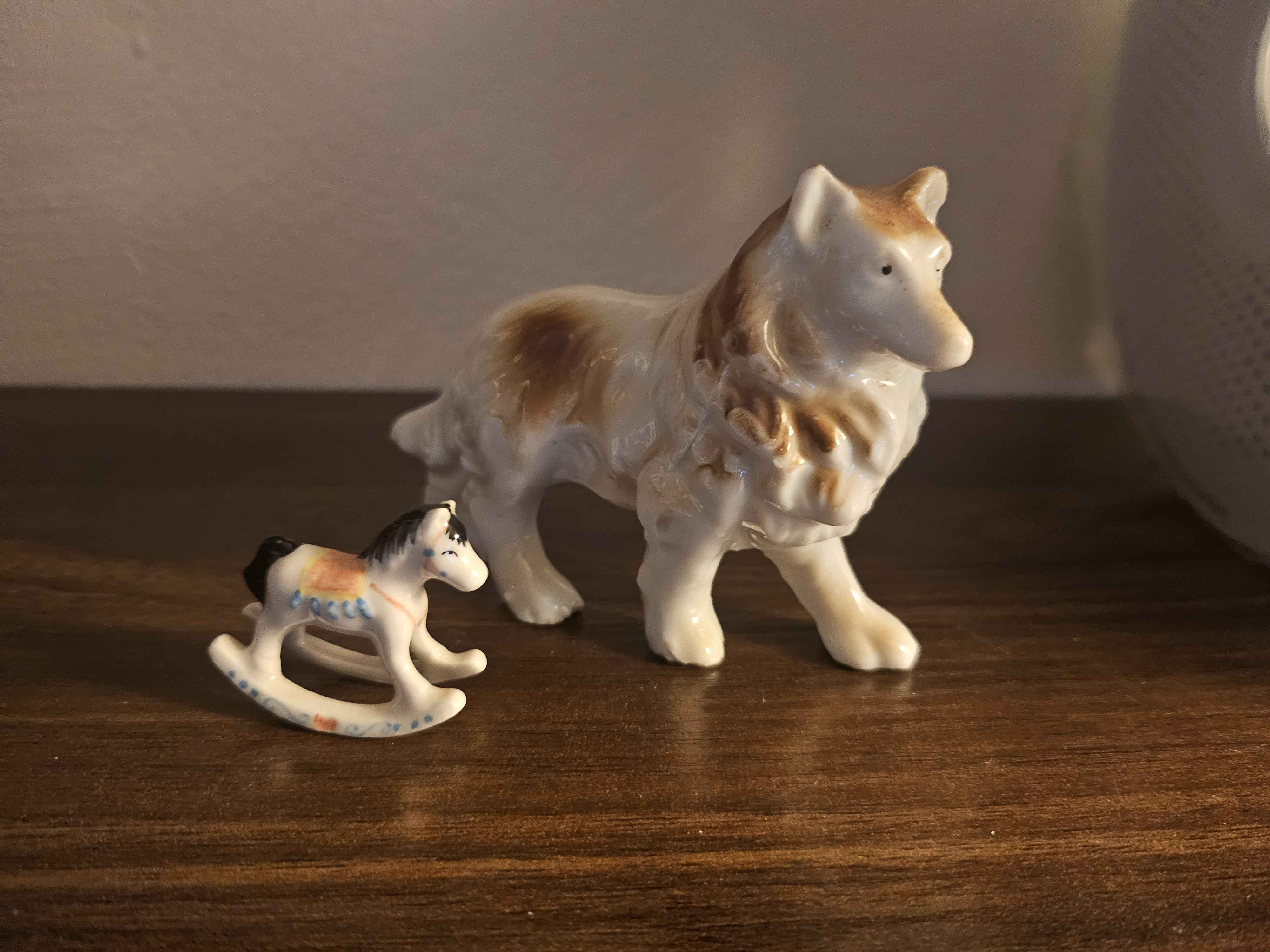 Porcelain collie and rocking horse