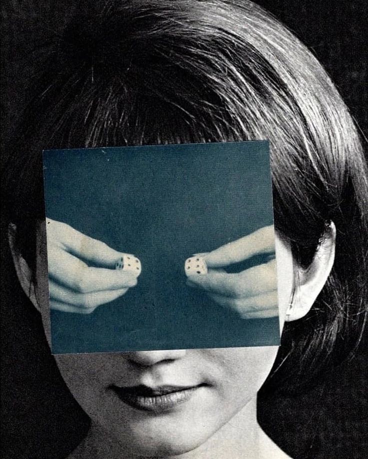 This may contain: a woman's face with two hands holding dices in front of her eyes