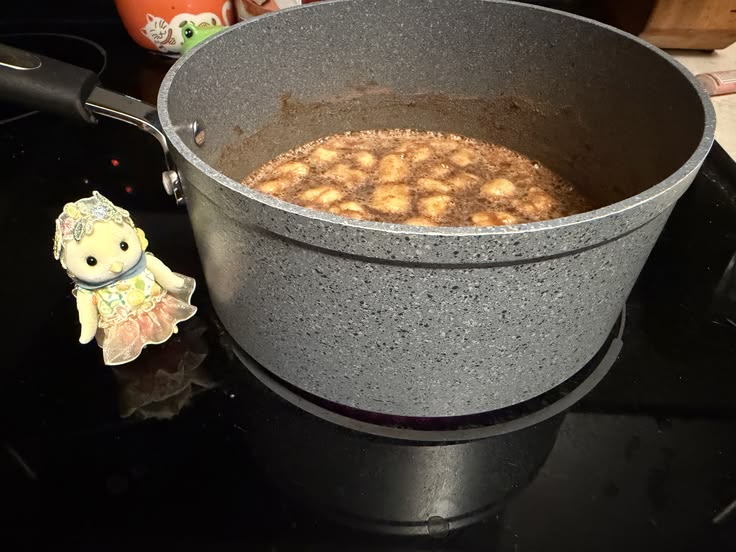 bird and pot cooking