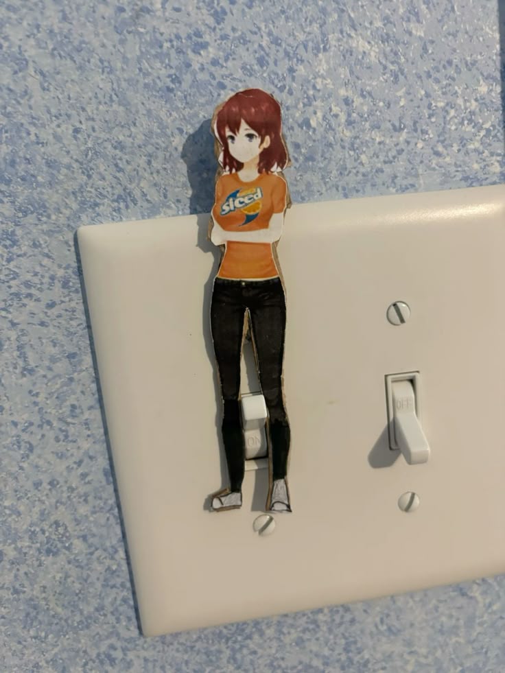 Ari on a lightswitch