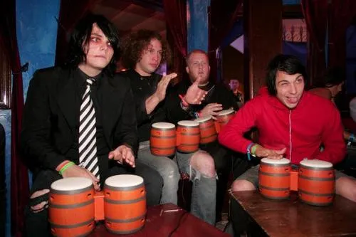 photo of my chemical romance (gerard is playing the drums))