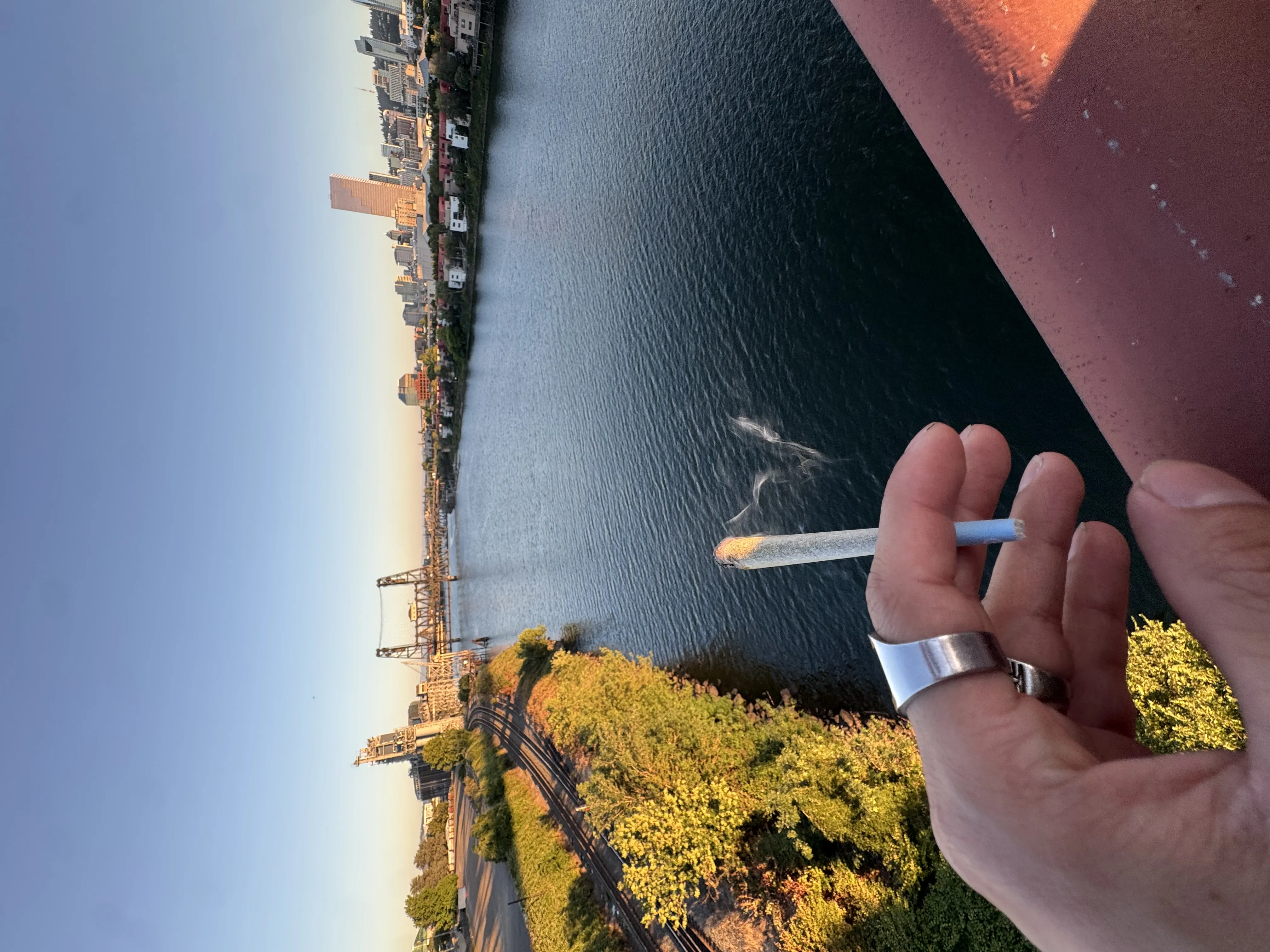 smoking a joint on a bridge