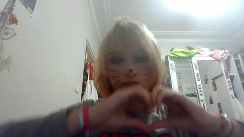 drawing cat whiskers on my face..