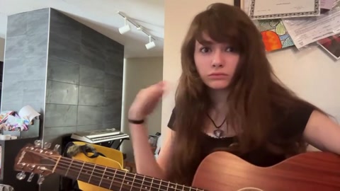 MAKIN GRILLED CHEESE..and playing guitar