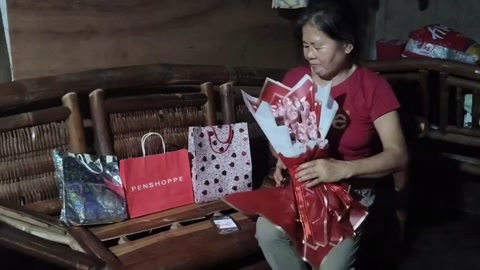Mother Virgie Opens Her Birthday Gifts
